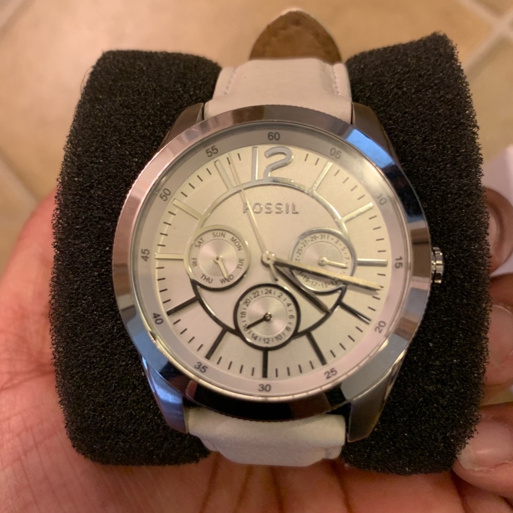 Silver and white fossil watch